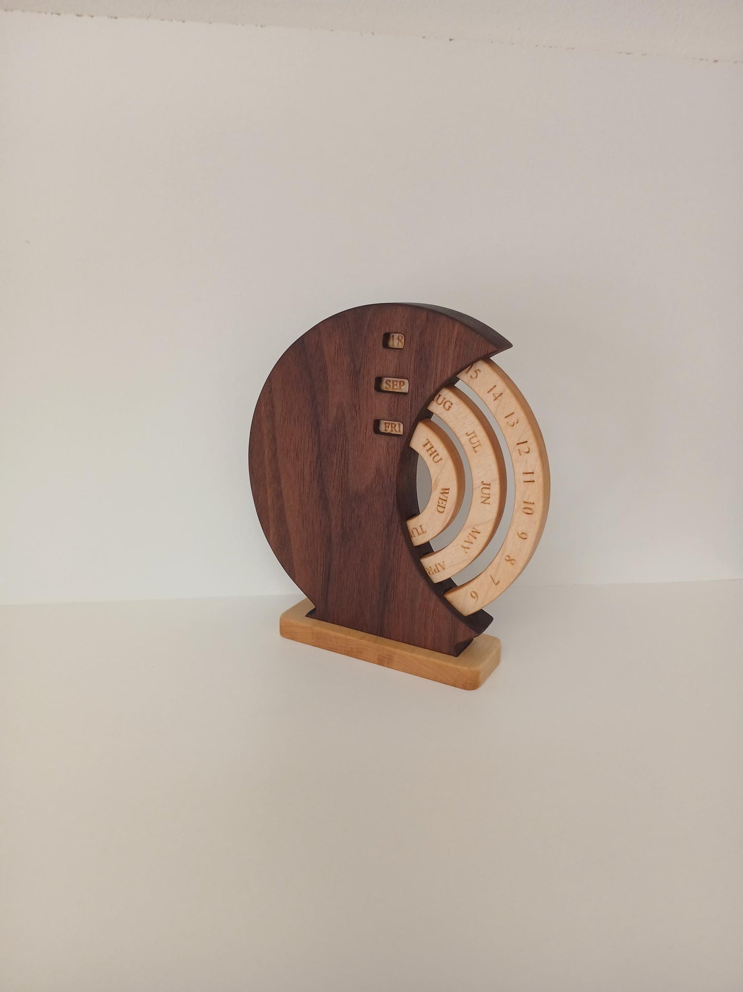 Solid Dark Walnut Desk Calendar with Hard Appalachian Maple Rings.