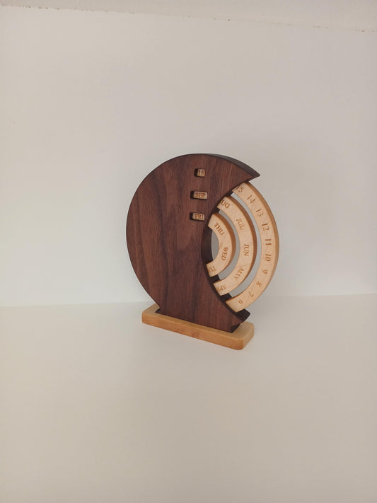 Solid Dark Walnut Desk Calendar with Hard Appalachian Maple Rings.