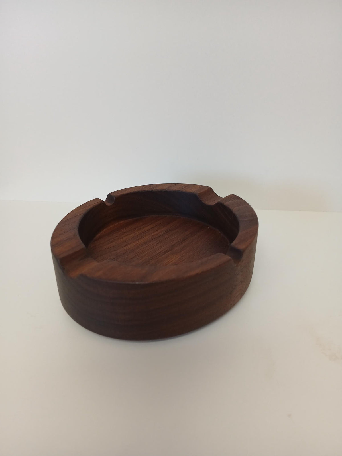 This Luxury Cigar Tray is made of Premium Walnut milled to an inch and three quarters. Handmade bespoke piece of home decor for use indoors or outdoors. Best gift for cigar smokers and luxury rentals. shown from the side