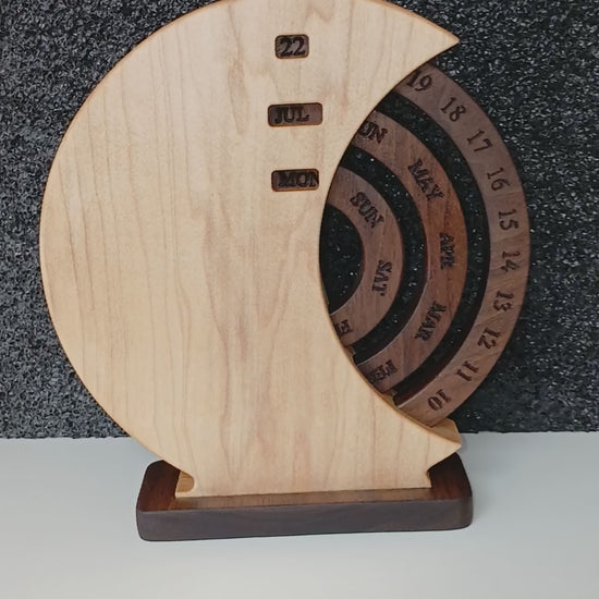 Video showing the Calendar in use. Wooden Perpetual Calendar with Maple shell and walnut rings and base. Beautiful home decor made in Taos New Mexico in the United States. Finished with natural oil and beeswax.